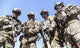 Special Forces Soldiers Poster Print by Oleg Zabielin featuring soldiers with weapons.
