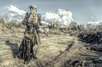 Post-apocalyptic survivor creature poster print featuring homemade weapons by Oleg Zabielin.