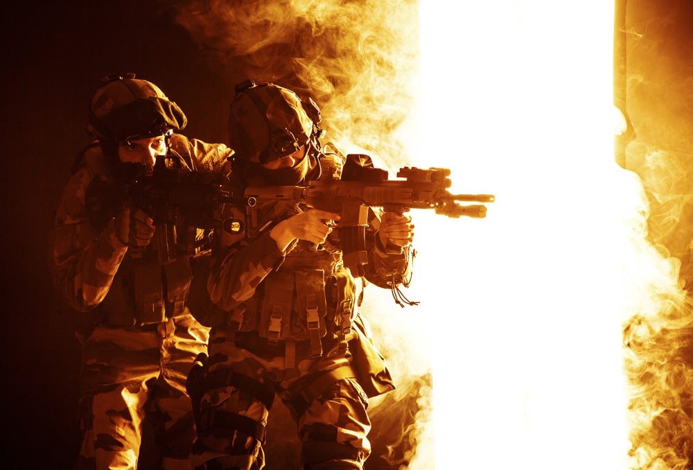 Paratroopers of French 1st Marine Infantry Parachute Regiment firing weapons poster print.