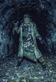 Post apocalyptic survivor holding pistol and machete in abandoned tunnel poster print by Oleg Zabielin.