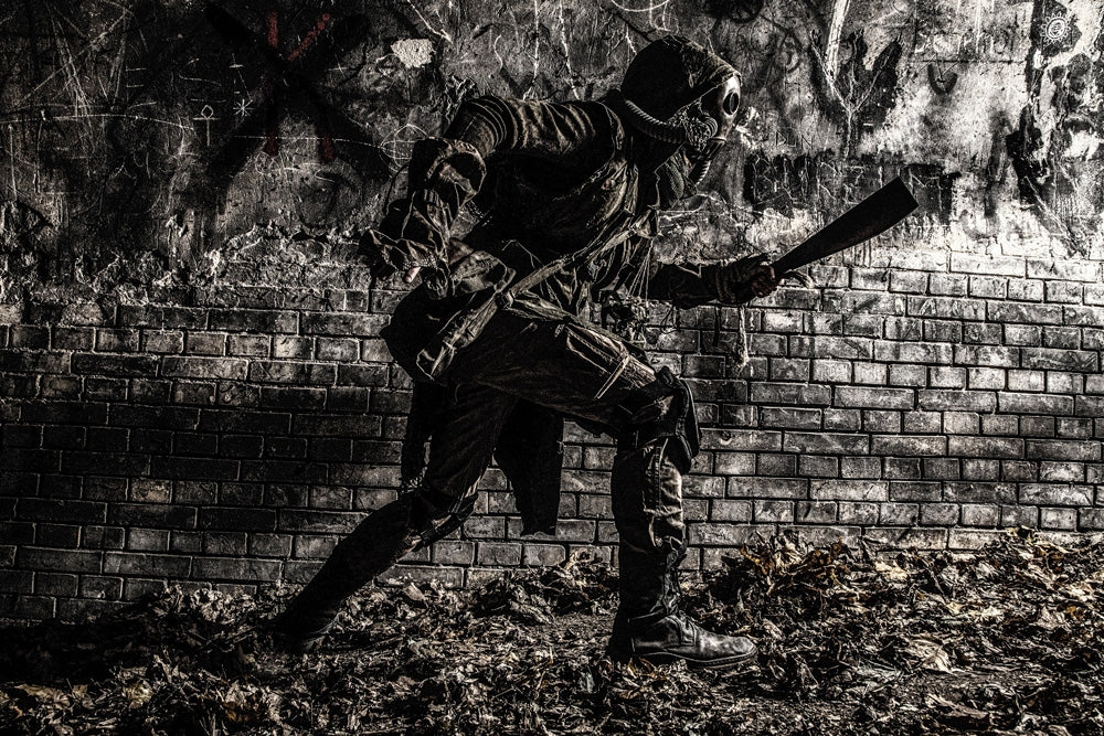 Post Apocalyptic Survivor Running Along Graffiti Wall Poster Print