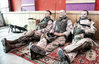 U.S. Marines talking and resting at a combat outpost poster print.