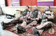 U.S. Marines talking and resting at a combat outpost poster print.