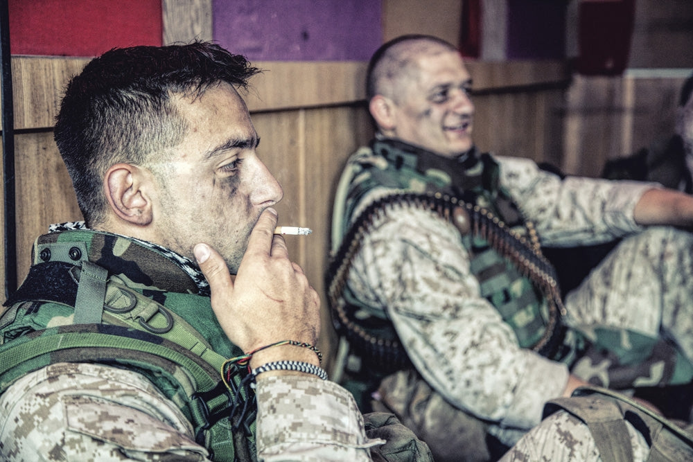 U.S. Marines Relaxing at Combat Outpost Poster Print by Oleg Zabielin