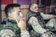 U.S. Marines Relaxing at Combat Outpost Poster Print by Oleg Zabielin