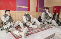 U.S. Marines resting at combat outpost poster print by Oleg Zabielin
