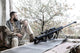 Navy SEAL sniper in abandoned building during urban warfare artwork by Oleg Zabielin.