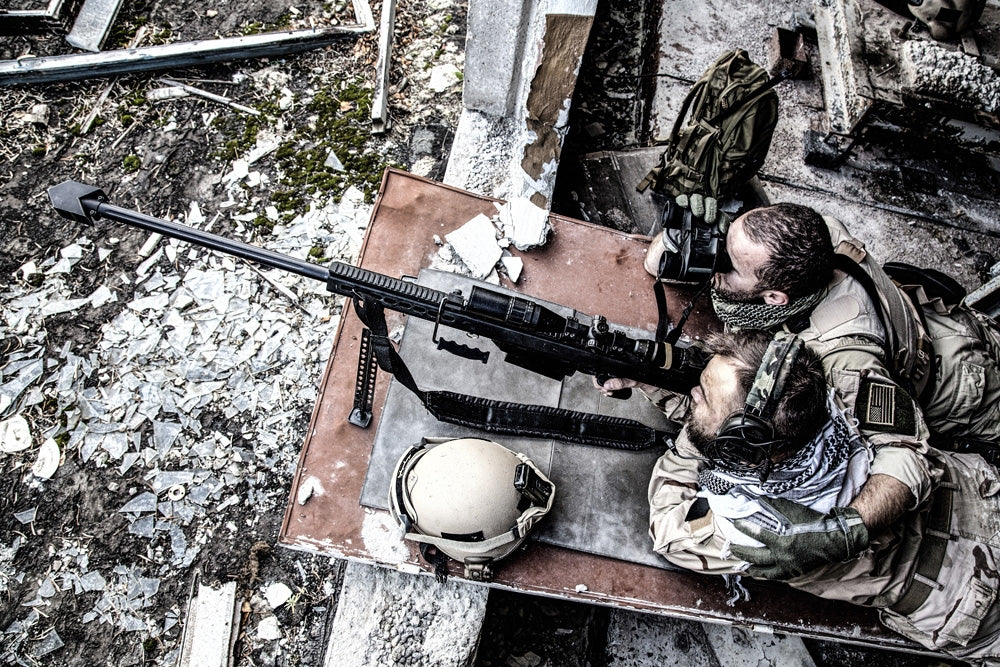 U.S. Navy SEAL sniper team firing from an abandoned building poster print.