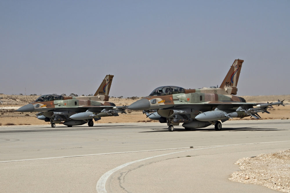 Two F-16I Sufa aircraft of the Israeli Air Force taxiing on the runway poster print.