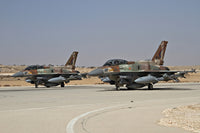 Two F-16I Sufa aircraft of the Israeli Air Force taxiing on the runway poster print.