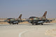 Two F-16I Sufa aircraft of the Israeli Air Force taxiing on the runway poster print.