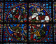 Rouen Cathedral stained glass poster print showcasing intricate designs and vibrant colors.