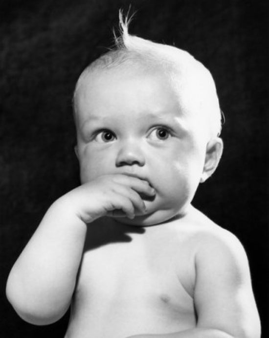 Studio portrait of baby boy poster print, perfect for nursery decor.