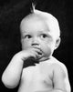 Studio portrait of baby boy poster print, perfect for nursery decor.