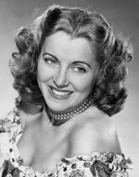 Close-up of a young woman smiling poster print