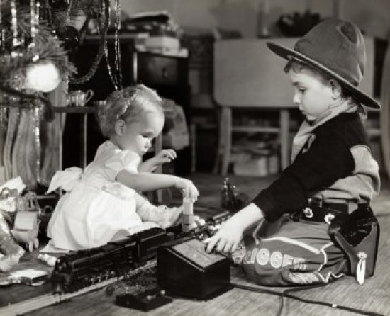 Side Profile of a Girl and Her Brother Playing with a Toy Train Poster Print