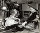 Side Profile of a Girl and Her Brother Playing with a Toy Train Poster Print