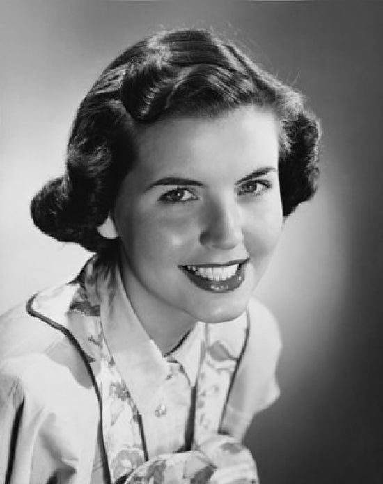 Portrait of a young woman smiling poster print, vibrant colors and quality.