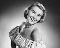 Close-up of a young woman smiling poster print.