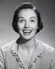 Young Woman Smiling Poster Print showcasing joy and positivity.