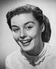 Portrait of a young woman smiling poster print