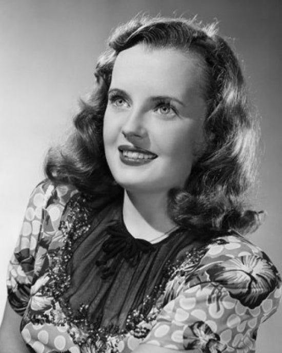 Close-up poster print of a smiling young woman
