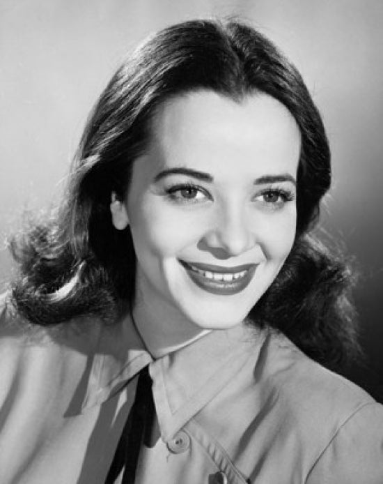 Close-Up of a Young Woman Smiling Poster Print