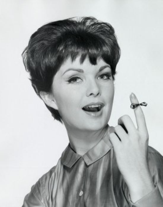 Portrait of a young woman with a string around her finger poster print.