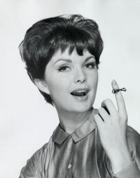 Portrait of a young woman with a string around her finger poster print.