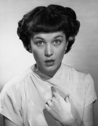 Portrait of a young woman pointing to herself poster print.