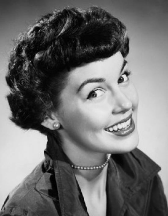 Portrait of a young woman smiling poster print