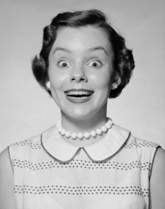 Portrait of a young woman looking surprised poster print