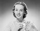 Portrait of a young woman smiling poster print