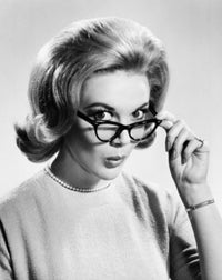 Close-Up of a Young Woman Holding Eyeglasses Poster Print