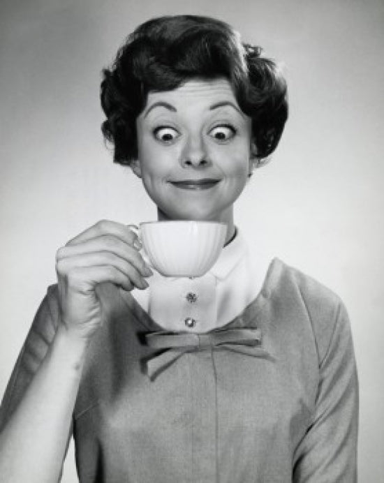 Portrait of a young woman holding a tea cup poster print