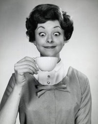 Portrait of a young woman holding a tea cup poster print