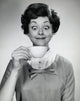 Portrait of a young woman holding a tea cup poster print