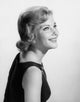 Side profile of a young woman smiling poster print