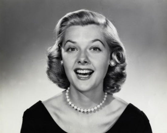 Portrait of a young woman laughing poster print, vibrant colors.