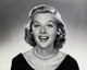 Portrait of a young woman laughing poster print, vibrant colors.