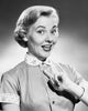 Studio portrait of a woman pointing to herself poster print.