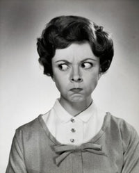 Portrait of a young woman making a playful face, poster print.