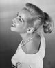 High angle view of a young woman smiling poster print