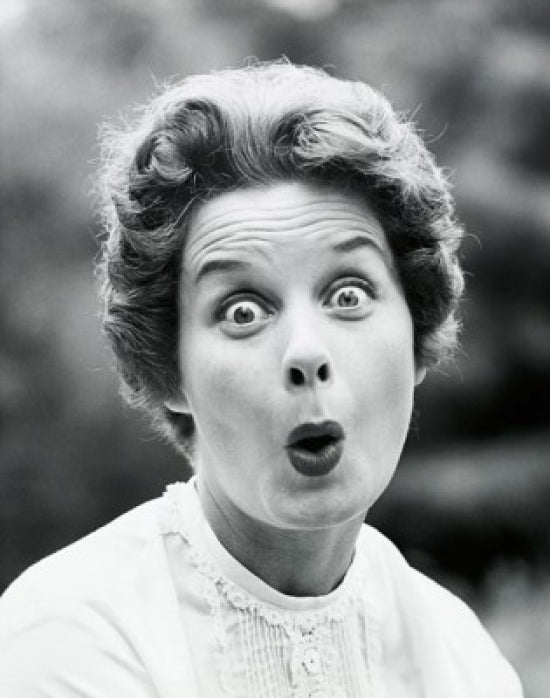 Portrait of a surprised young woman poster print