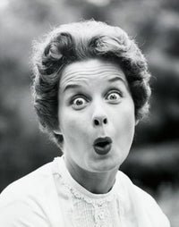 Portrait of a surprised young woman poster print