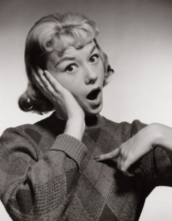 Portrait of a young woman pointing poster print
