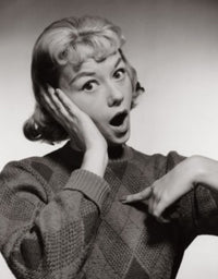 Portrait of a young woman pointing poster print