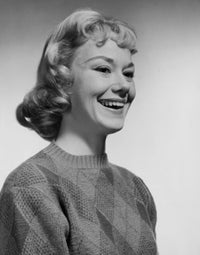 Close-up of a young woman smiling poster print, perfect for home decor.