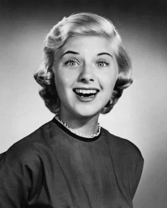 Portrait of a young woman smiling poster print