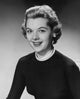 Portrait of a young woman smiling poster print